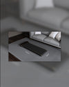 WalkingPad Z1 foldable walking treadmill shown in a living room with 1415 mm x 550 mm footprint dimensions