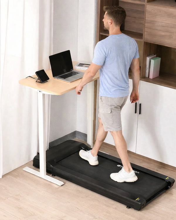 LifeSpan TR1200 pro under-desk treadmill in use with a standing desk for UK home office walking