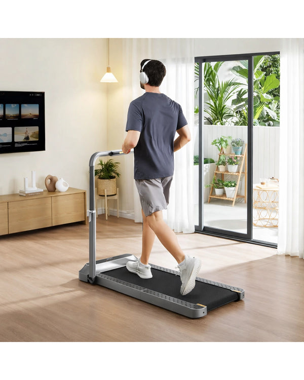 WalkingPad R2 walk-run 2-in-1 folding treadmill in a modern UK home running at home lifestyle image